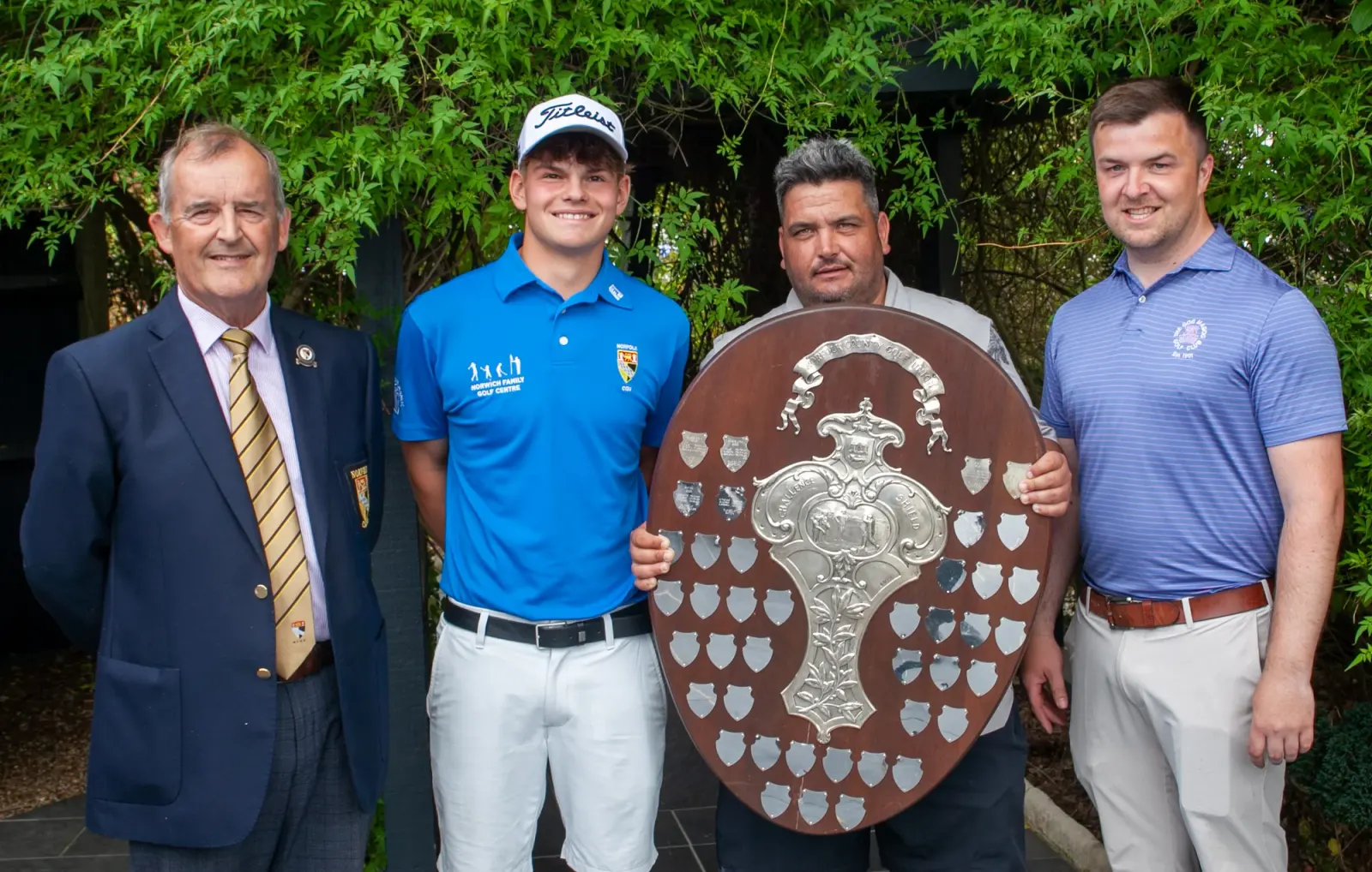 NCGU president Stuart Goodman presents the shield to team trophy winners, Thetford – Sully Goddard, Danny Loveday and Ed Dimambro
