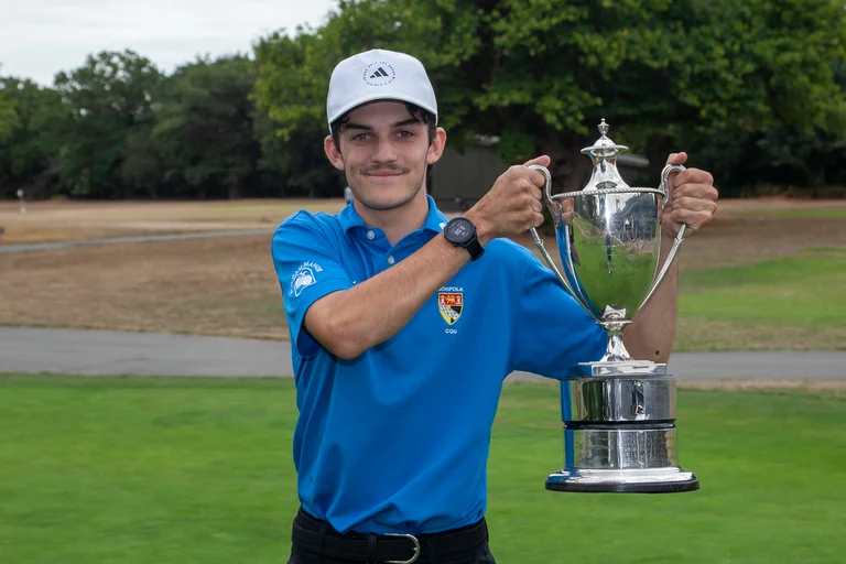 Liam Caffyn celebrates his two-shot success in the Norfolk Boys Championship